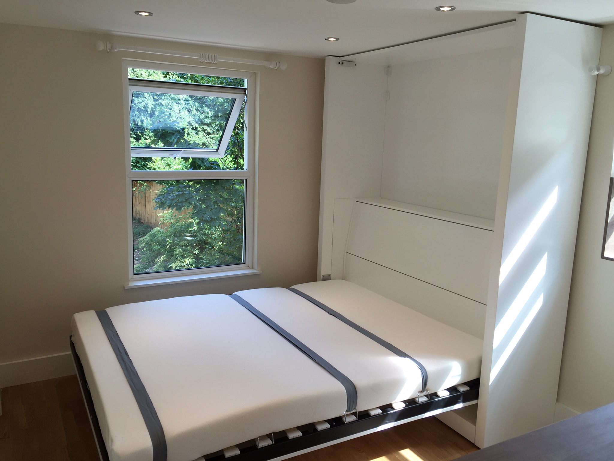 Double vertical clearance wall bed